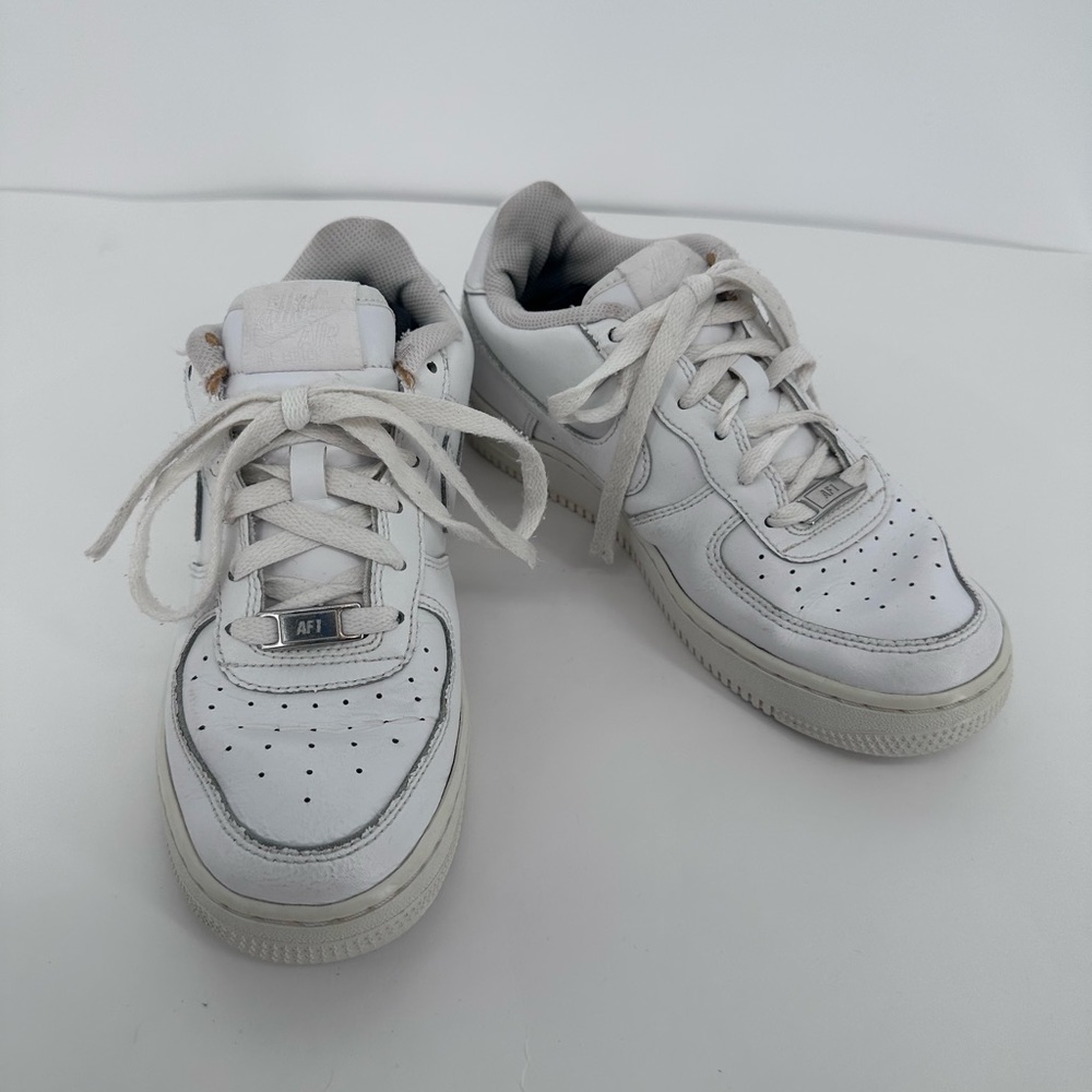 Nike Air Force Ones Triple White Low Top Sneakers